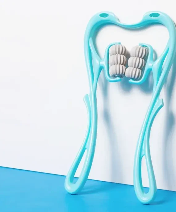 Massageapparat til nakken