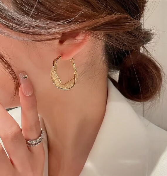 Elegante twist-øreringer